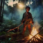 Generate an ultra high definition image depicting a story of survival and adventure. Picture this: a brave 7-year-old boy of Hispanic descent, conquering the natural elements around him. He is standing triumphantly by a small bonfire he managed to light, in a dense, untamed forest. The evening light shines on his brow, which has a slight sheen from exertion, as he holds a handmade fishing spear, indicating his self-sufficiency. His clothes are somewhat tattered and dirty, making him a persona of resilience and courage against the backdrop of the wild.